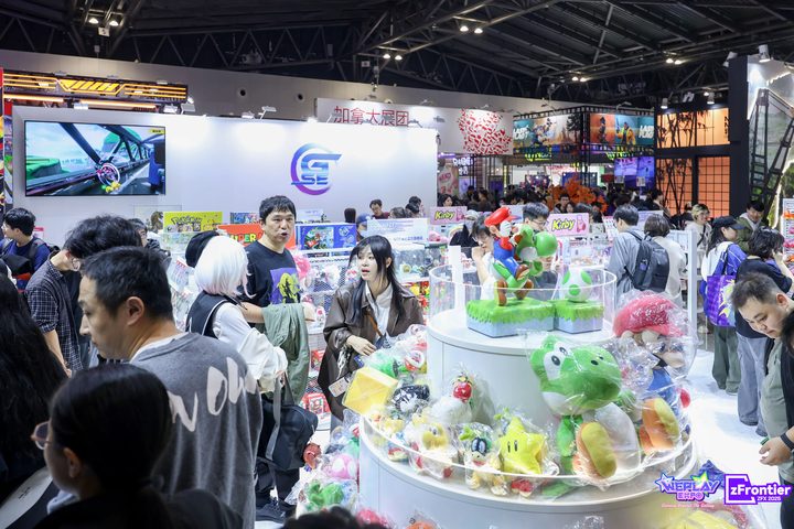 An exhibitor booth displaying figures and other merchandise at a past WePlay Expo