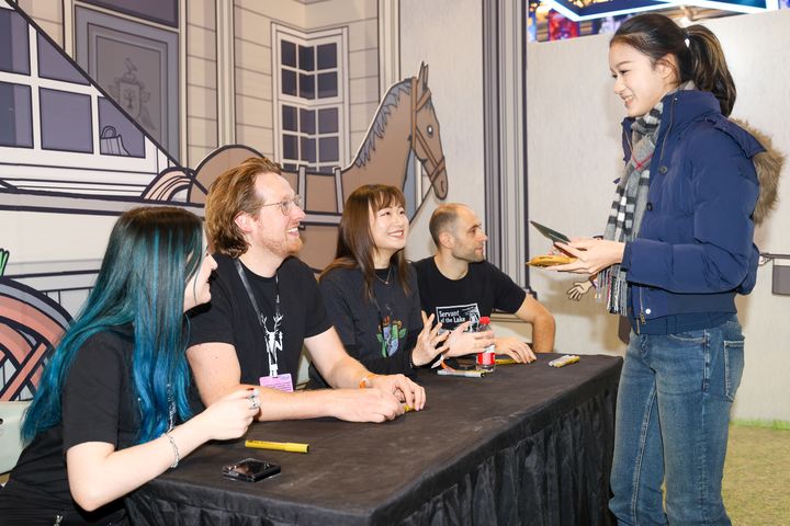 Developers and visitors connecting at a previous WePlay Expo